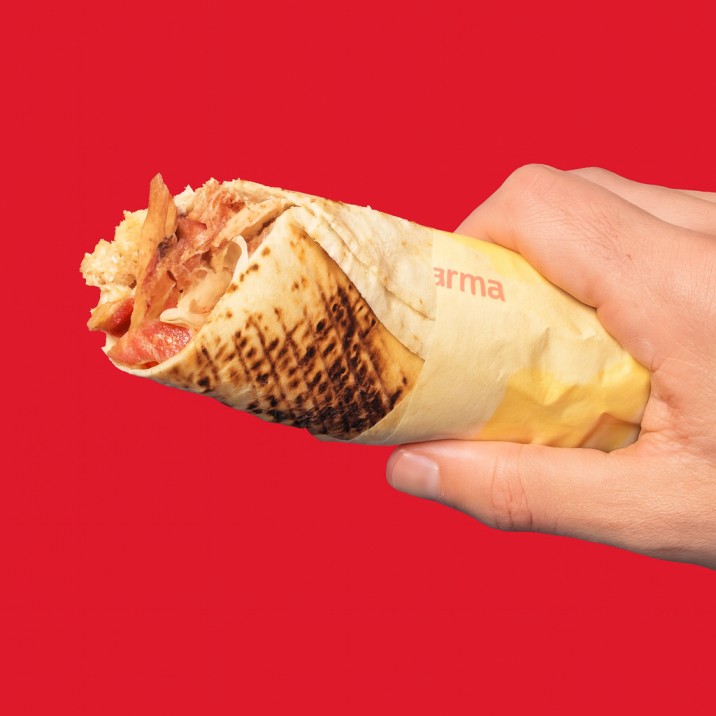 Baba Saj Fresh falafel pita sandwich with creamy sauce is ready to be devoured.
